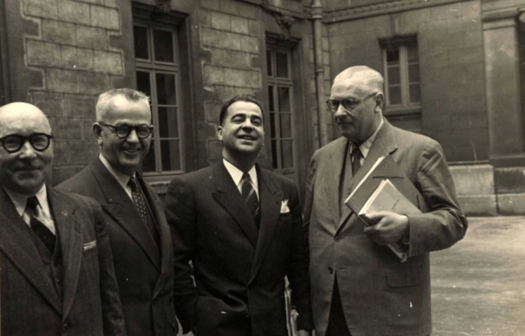 De gauche à droite : Philippe DANILO, un homme non identifié, M. CAUSERET, Armand HAOUR (de profil).
